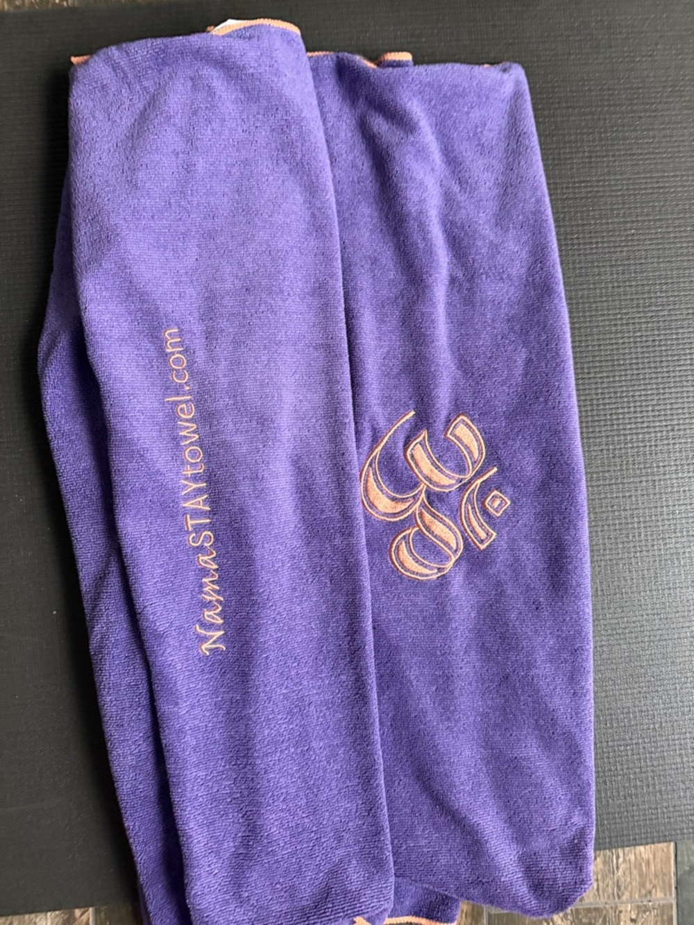 NamaStay yoga mat with sleeves on both ends that wrap around your mat.